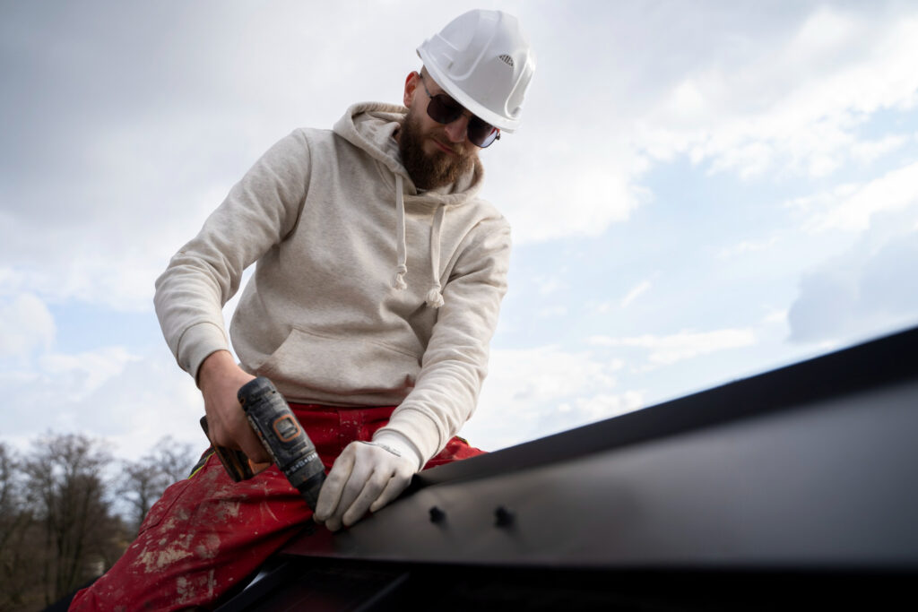 man maintaining commercial roof